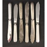 WHITE STAR LINE: Harlequin set of six fish knives with reeded handles.