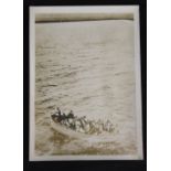 R.M.S. TITANIC: Period sepia photo, stamped M.ROL of Paris, a lifeboat rowing towards the Carpathia.