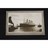 R.M.S. TITANIC: Pre-maiden voyage real photo postcard of Titanic leaving Southampton, signed by