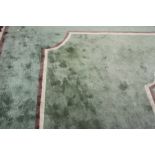 Carpets: 20th cent. Green ground Chinese style carpet, maroon & white borders, 2 canted corners to