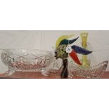 20th cent. Glassware: Cut glass bowl on 3 supports, single glass candle holder, boat shape cut glass