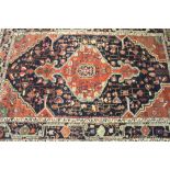 Rugs: Hand knotted Kayseri rug from Turkey. Blue ground, central single medallion in a temple garden