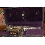 1920s Musical Instruments: Raymond Duboil Essor saxophone, complete with reeds case, distressed.