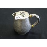 19th cent. White metal (tests silver) Anglo Indian teapot profusely chased, foliate designs with