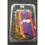 Manchester Unity of Oddfellows shoulder sash in purple red edge gilt frills with medallion and
