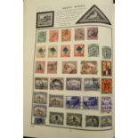 Stamps: Meteor stamp album containing world stamps including GB brown/red cover.