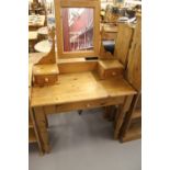 20th cent. Pine dressing table, single front drawer, mounted mirror. 36ins. x 57ins. to mirror