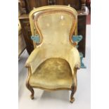 19th cent. Mahogany framed button backed nursing armchair, serpentine front.