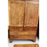 19th cent. Figured mahogany linen press, two over 3 drawers on shaped brackets, the upper cupboard