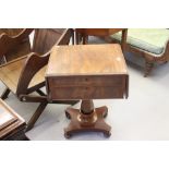 19th cent. Oak & mahogany single pedestal work box with 2 drawers, drop flaps rising off bun feet.