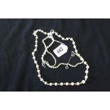 Jewellery: Simulated pearl necklace, clasp marked 375 set with marcasite and a single pearl x 1