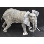 20th cent. Sculpture: Wire framed lead covered studio elephant by Paul Szeiler. Length 17ins x 11ins