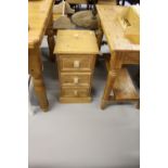 20th cent. Pine 3 drawer bedside chest. 12ins x 24ins x 12ins.