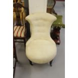 19th cent. Upholstered button back nursing chair.