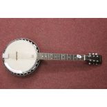 Musical Instruments: Kimaxe (Korea) reverb 6 string banjo. Remo weather head (USA) and a rosewood