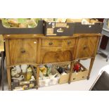 19th cent. Bow fronted sideboard, 2 central drawers, flanked by cupboard.