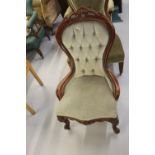 19th cent. Mahogany button back saloon chair.