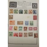 Stamps: Meteor stamp album containing world stamps including GB, brown/red cover.