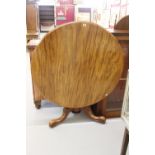 19th cent. Mahogany tilt top table, tripod supports with carved fruit decorating each support (pear,