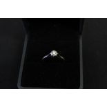 Hallmarked 9ct. white gold ring with diamond. Illusion set, size M.