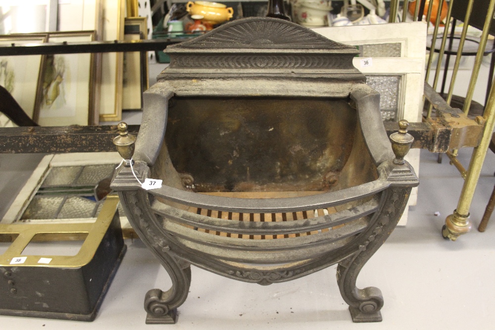 19th cent. Regency style fire basket; shield shape top front with brass 'guard' finials & sunburst