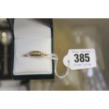 Hallmarked Gold: 18ct and diamond ring boat setting of 5 stones 2.9g approx.