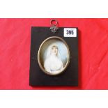 Early 19th cent. Oval portrait miniature of a young woman on ivory. 3½ins.