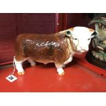 20th cent. Ceramics: Nelson Pottery Hereford bull, green label beneath 6ins x 9ins.