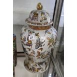 20th cent. Oriental butterfly ginger jar and cover. 19ins.