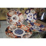 19th cent. Imari blue and red oxide scalloped edge plates. (4)