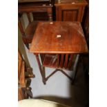 19th cent. Revolving bookcase with table top; turned columns & stretcher. 18½ins. x 27ins. x 18½