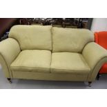 Laura Ashley: Oatmeal fabric upholstered contemporary two seater sofa; with original information &