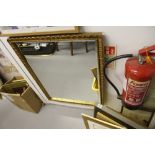 Early 20th cent. Gilt framed gesso mirror 24ins x 33ins.