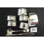 Hallmarked Silver: Napkin rings, 3 matching butter knife and mustard spoon, various marks Sheffield,