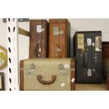 20th cent. Luggage: Leather suitcases and a hat box with period transport labels.