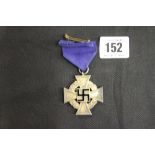 WWII/Third Reich Captain John Hodge Archive: German 25 year Long Service Award in silver with blue