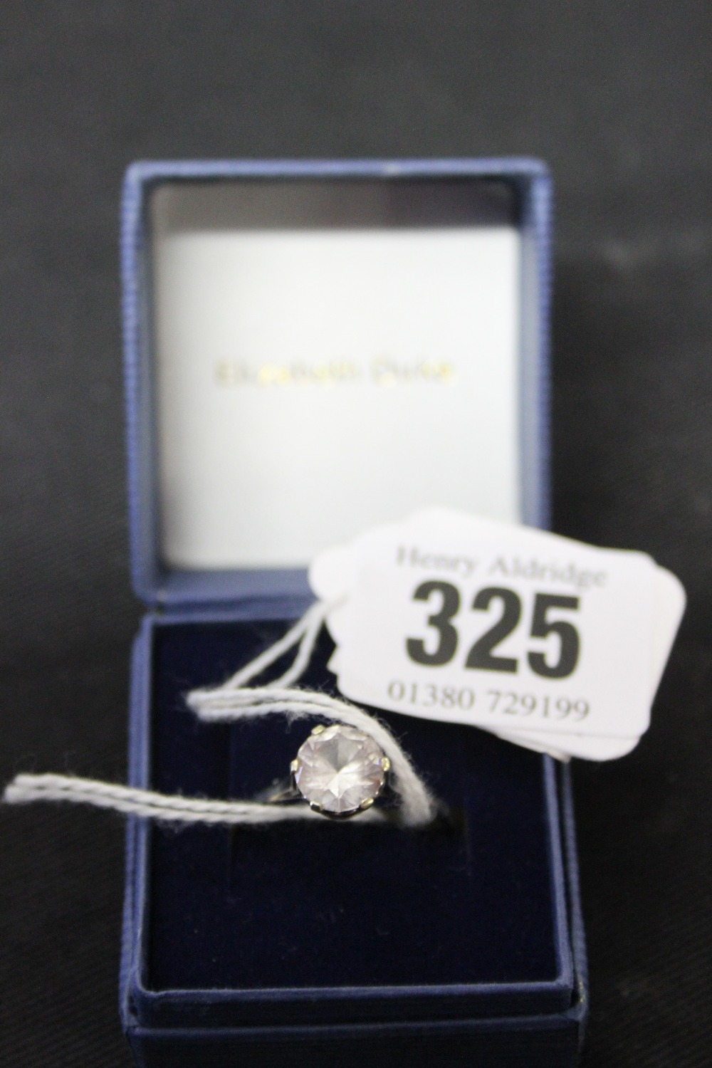 Jewellery: White metal dress ring, white sapphire set, 9ct. and tested. 2.8grams. inclusive.