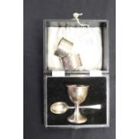 Hallmarked Silver: Christening set - boxed egg cup & spoon, and napkin rings unboxed - a pair. 2.