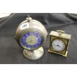 Clocks: Hammer beaten aluminium cased clock, balloon shaped with a French movement, bedside clock