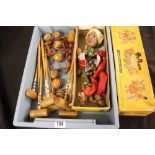 Early 20th cent. Games: Boxwood table croquet and a Pelham puppet snake charmer, boxed.