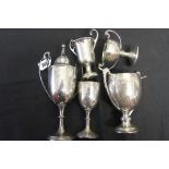 Hallmarked Silver: Trophies inscribed for golf and tennis 18ozs plus an ebony & ebonised trophy