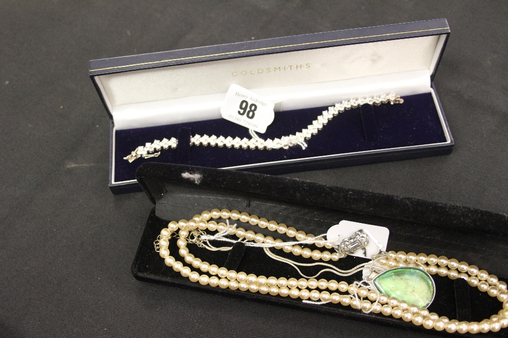 Costume Jewellery: Tennis bracelet set with crystal stones clasp white metal marked 975, 2 strand