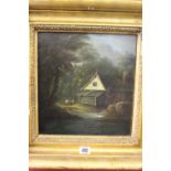 19th cent. English School: Oil on canvas of a mill by a stream in woodland, unsigned in heavy gilt