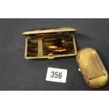 Snuff Boxes: Tortoiseshell cheroot case with gilt fitting and a horn snuff box.