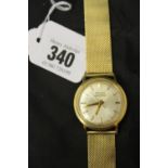 Watches: 18ct. Gold gentleman's Bulova Accutron wristwatch, both the watch and strap are stamped