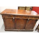 19th cent. Mahogany 3 drawer sideboard above 3 doors rising off a plinth.