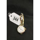 20th cent. Ladies 9ct. gold wristwatch on expanding bracelet.