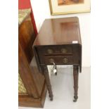 19th cent. Mahogany dwarf Pembroke table, false drawer fronts to one end and 2 drawers to the