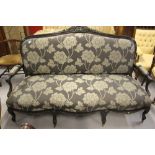 19th cent. Ebonised walnut 3 seater sofa serpentine fronted 6 shaped supports carved cresting rail
