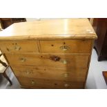 20th cent. Pine chest of 2 over 3 drawers with brass furniture. The whole on turned supports. 42½